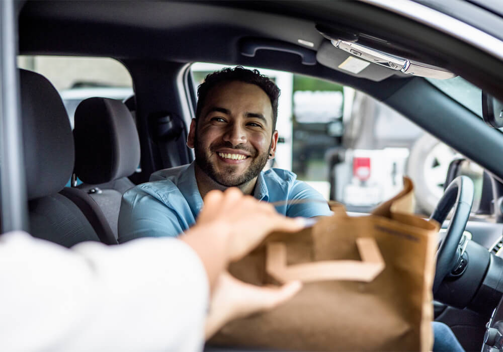 Diner receiving curbside pickup order