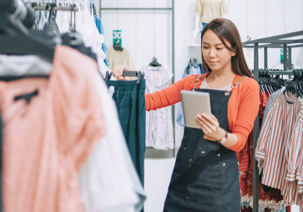Retail associate uses mobile POS to do inventory or fulfillment