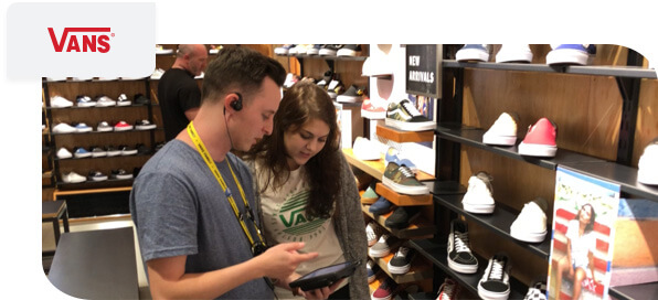 VANS logo with image of Vans associate helping customer with mobile POS
